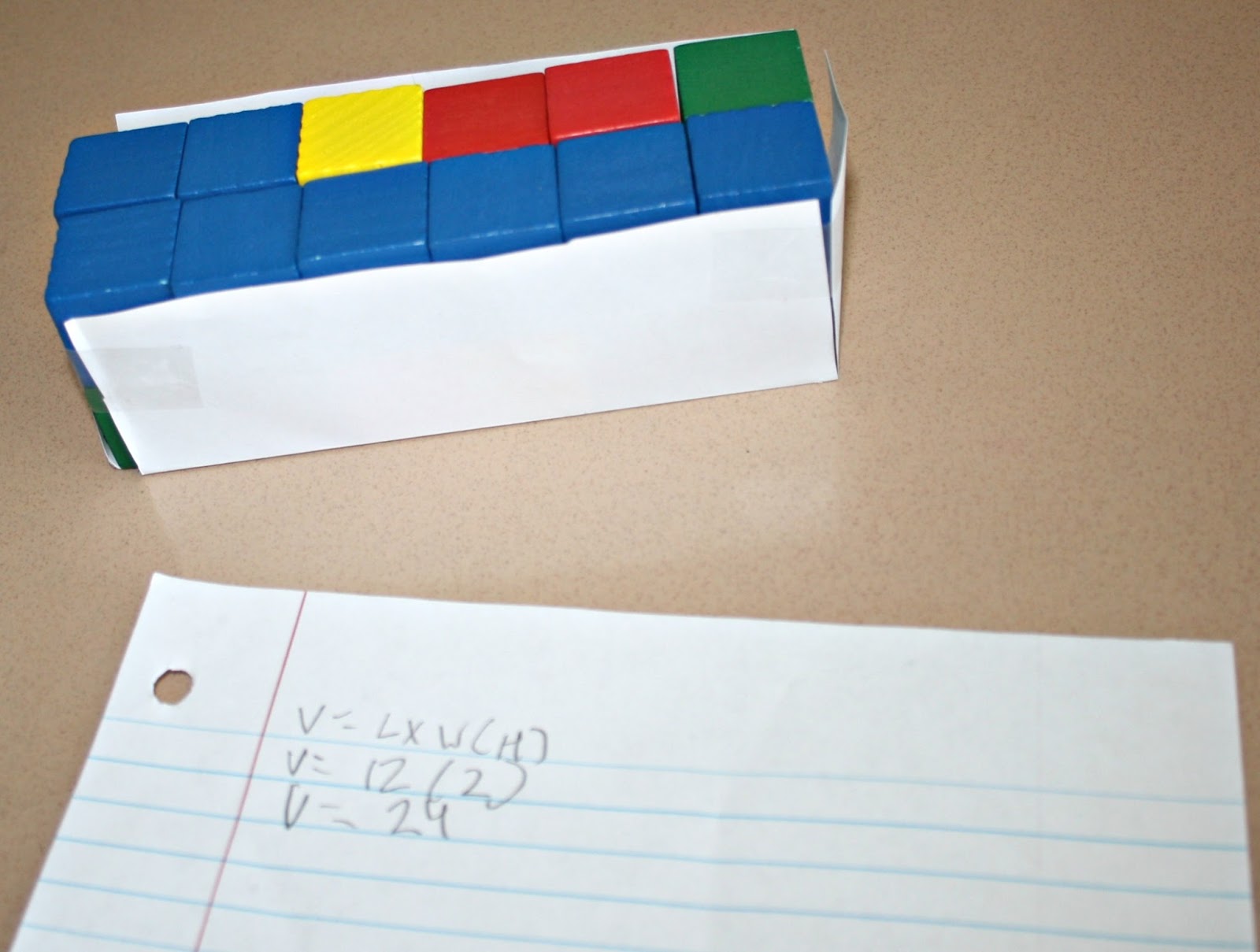 Students love a hands on learning activity! This simple FREE printable will get your students up and their brains moving while coming up with their formula to calculate the volume of the shape they created. Then having the students create their own shape, and the rest of the class must find the volume, creates a bunch of AH HA moments! Be sure to grab this freebie!{freebie, geometry, math activities, upper elementary}