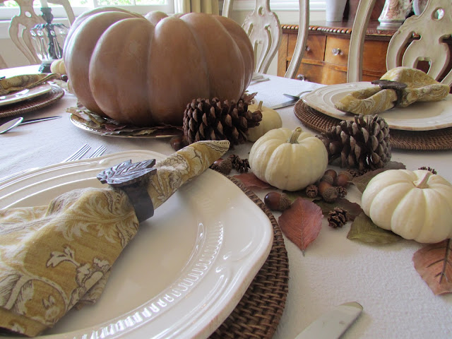 traditional fall tablescape with fairytale pumpkin and natural accents