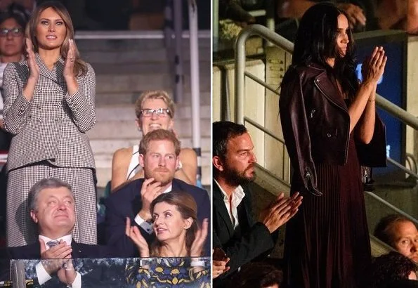Prince Harry, Melania Trump and Justin Trudeau at Invictus Games. Meghan Markle wore Mackage Baya Leather Jacket and Aritzia Beaune Dress