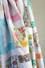 Cute throw quilt called Framed Squares - a free quilt pattern from A Bright Corner