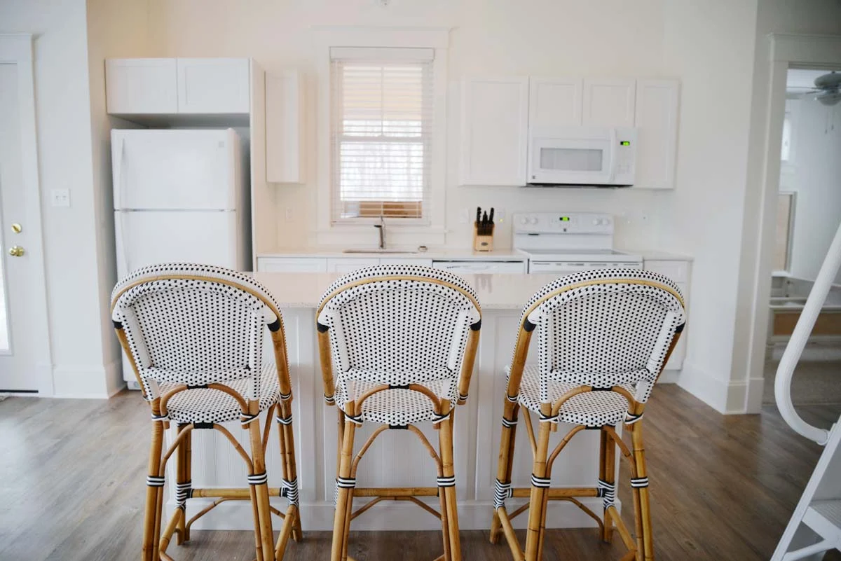 white cottage kitchen | Serena & Lily black white Riviera french bistro counter stool