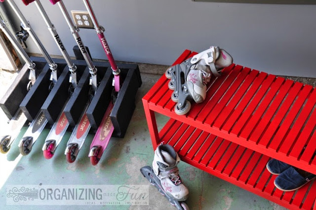 Scooter organizer and a red bench for sitting down to put on roller blades :: OrganizingMadeFun.com