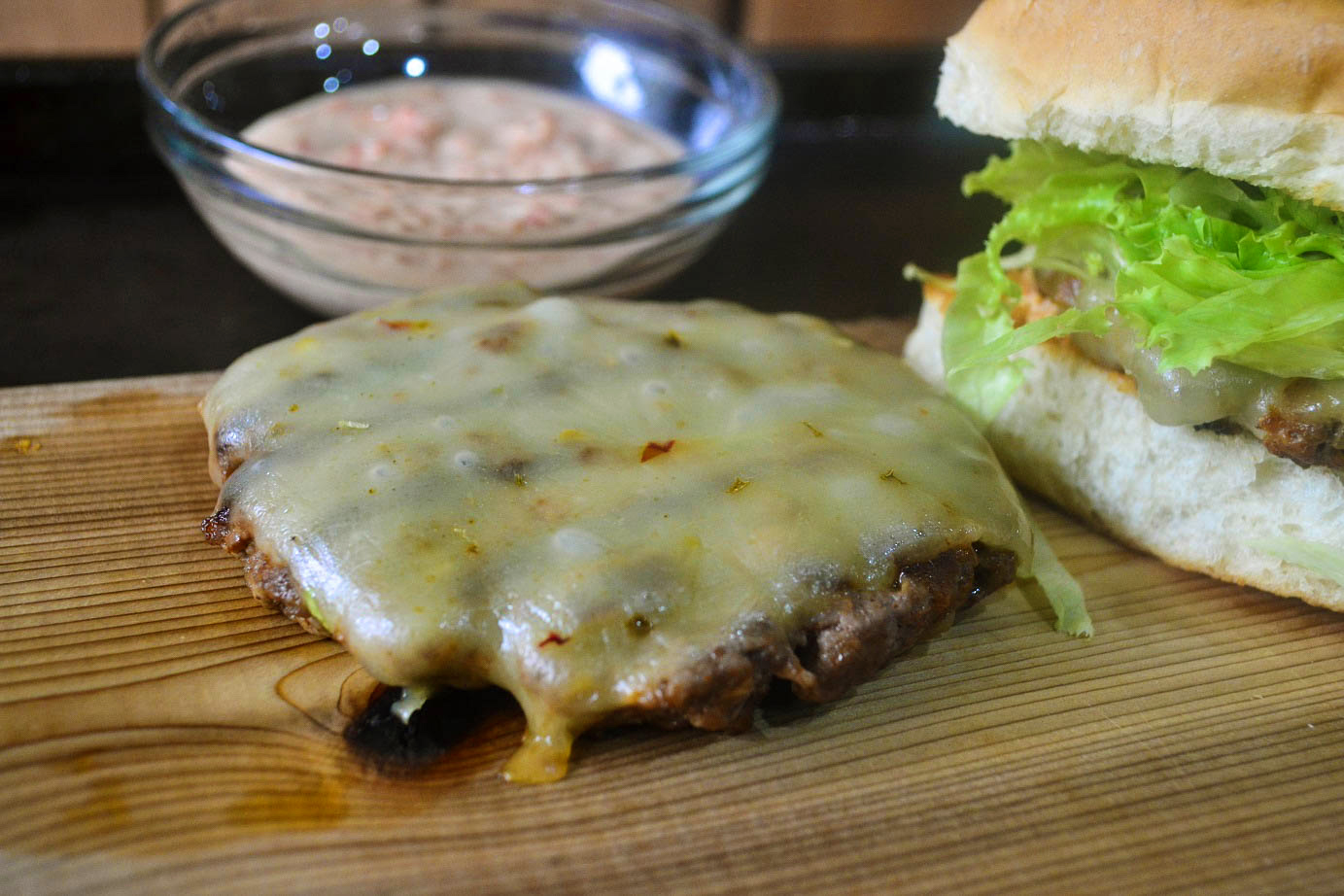 Greedy Girl Jerk sausage beef burgers with a roasted red pepper mayo