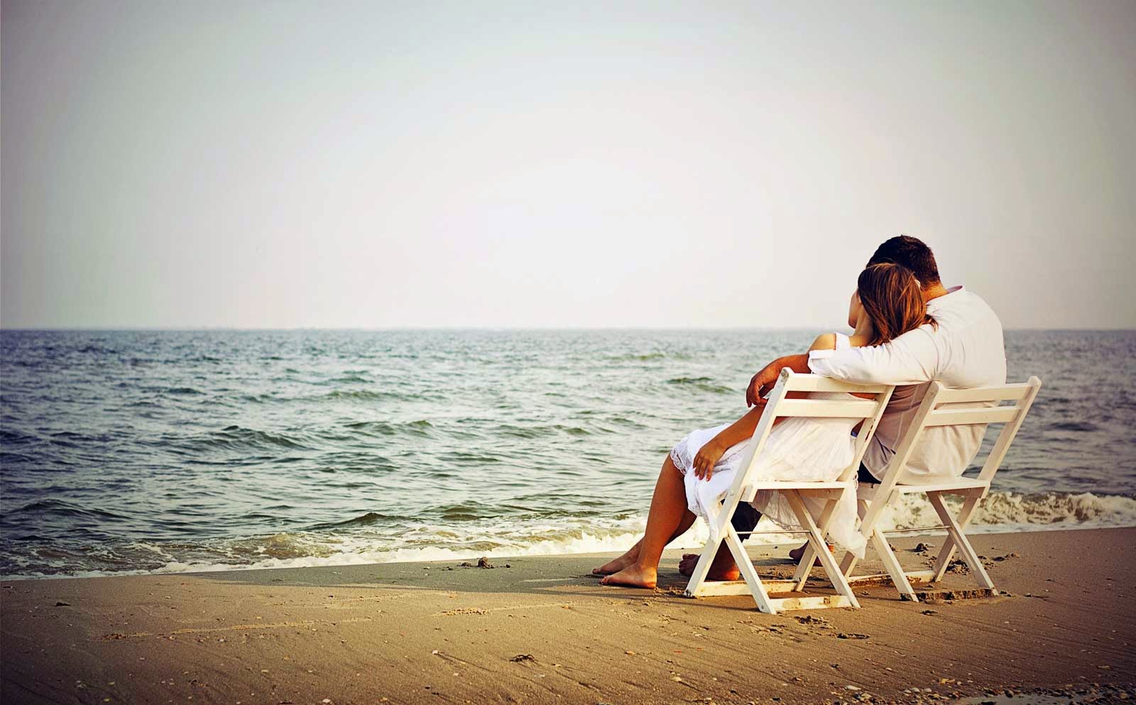 Romantic Couple Enjoying the Beauty of Sea