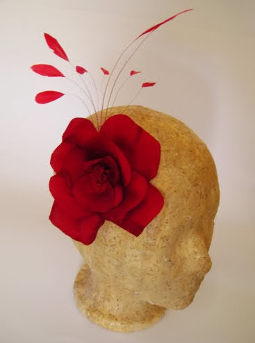 red silk rose with feathers
