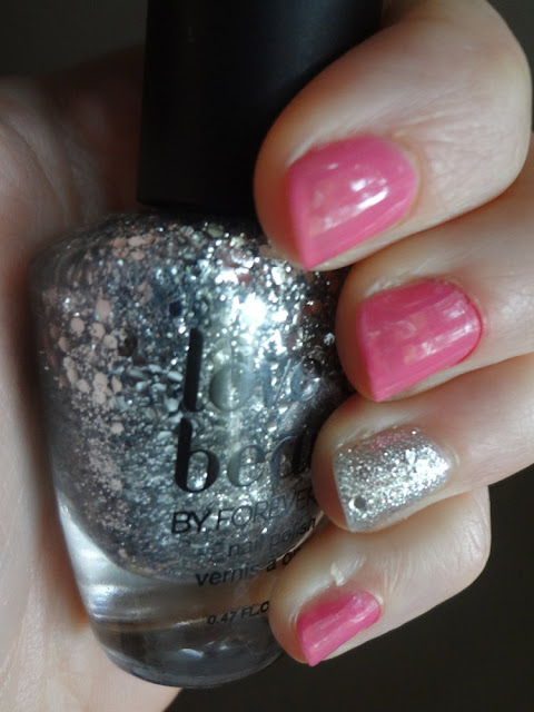 silver glitter accent nail with pink polish