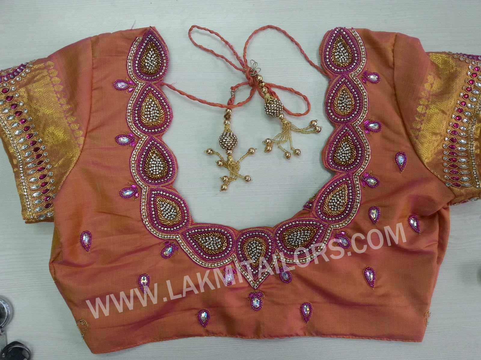 Wedding blouse hand embroidery designs from lakmi tailors