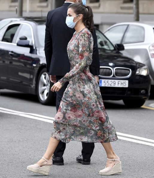 Queen Letizia wore a floral print midi dress from Zara, and canvas espadrille wedges by Macarena, Queen wore a gold earrings