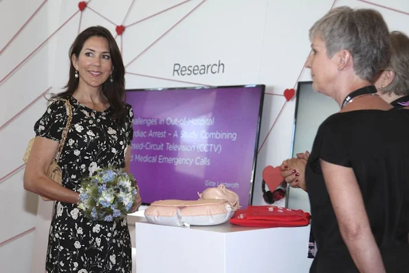 Crown Princess Mary attended the opening of Europe Emergency Medical Services 2016 Congress at Tivoli hotel. Princess Mary wears Christian Louboutin shoes, Style Chanel beige Jumbo Classic bag