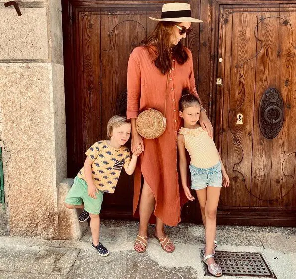 Princess Claire, Princess Amalia and Prince Liam. Princess Claire is wearing a Jane terracotta dress by the brand Young Empire