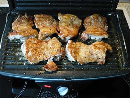 grilled chicken legs without bones on a electric grill
