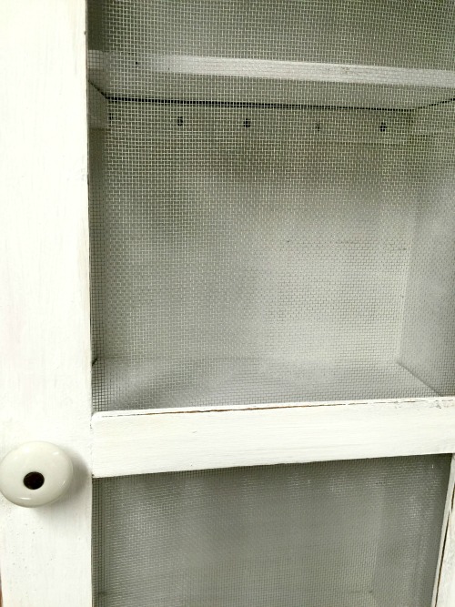 How to Repurpose a Clock into a Farmhouse Bathroom Cabinet www.homeroad.net