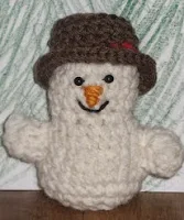 http://www.ravelry.com/patterns/library/little-snowpeople
