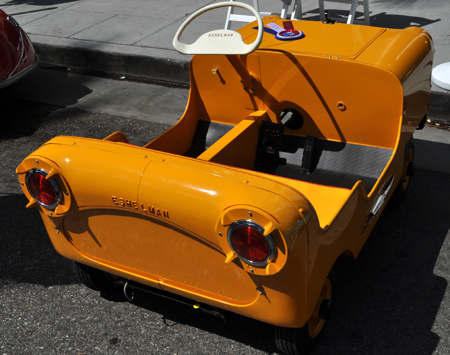 Just A Car Guy Eshelman Sport, because the other model is smaller!