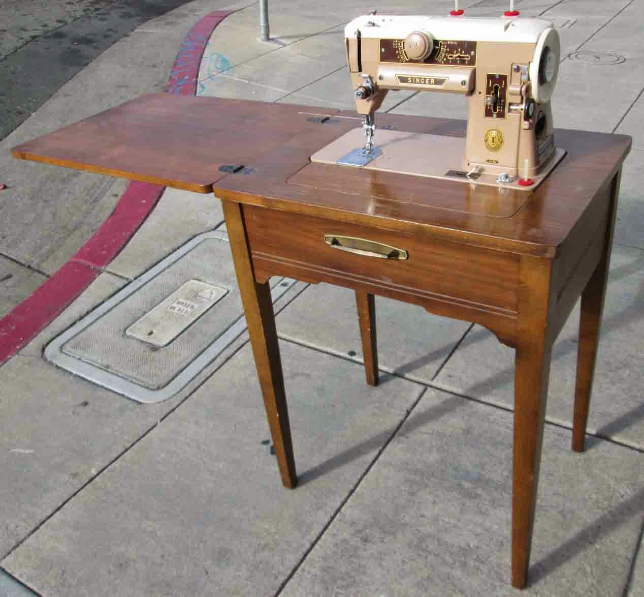 UHURU FURNITURE & COLLECTIBLES: SOLD Singer Sewing Machine in Cabinet - $60