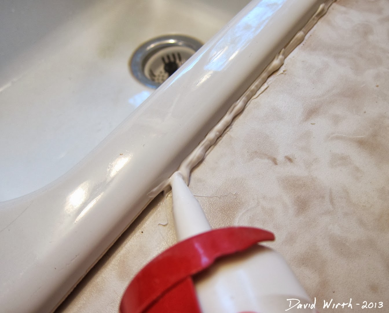 Fix Caulk Around a Sink