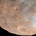 Mars moon Phobos got its grooves from rolling stones, study suggests