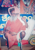 baba singing son at bhajan mandap