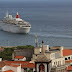 a ship quietly leaving the port