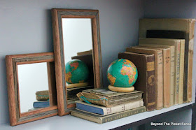 old books and rustic mirrors