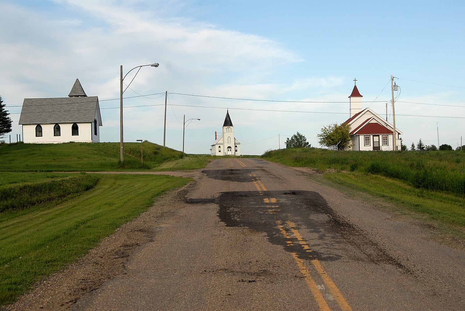 autoliterate Three Churches, Saskatchewan