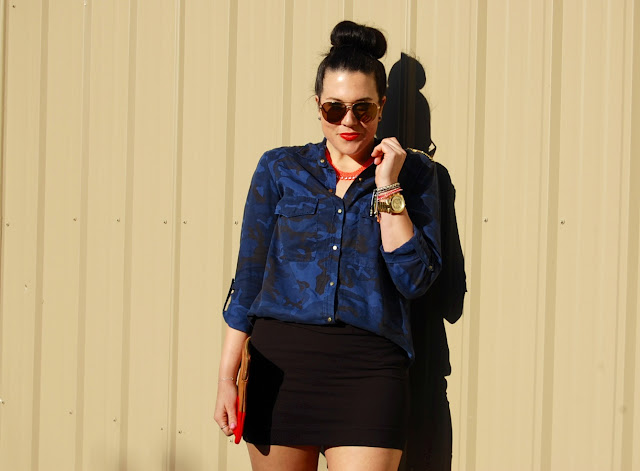 Zara camo blouse, black mini skirt, Topshop necklace, Gap two-tone clutch and Topshop heels.