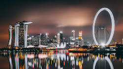 singapore skyscrapers buildings shore night 4k desktop wallpapers backgrounds