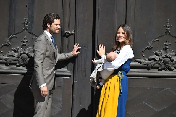 Prince Carl Philip, Princess Sofia Hellqvist and son Prince Alexander open the gate of the Royal Palace for the National Day Celebrations