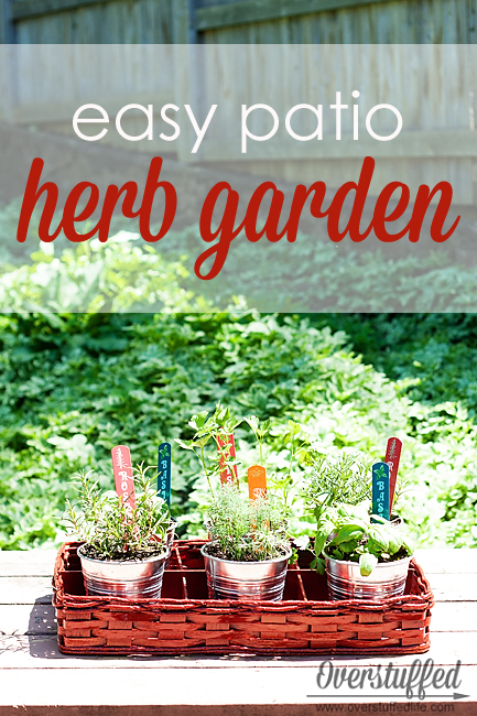 Easy Patio Herb Garden An easy patio herb garden using cheap IKEA buckets, a thrifted basket, and a little bit of spray paint