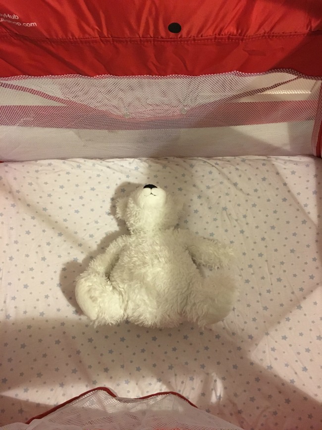 Babyhub-sleepspace-travel-cot-teddy-bear-in-cot