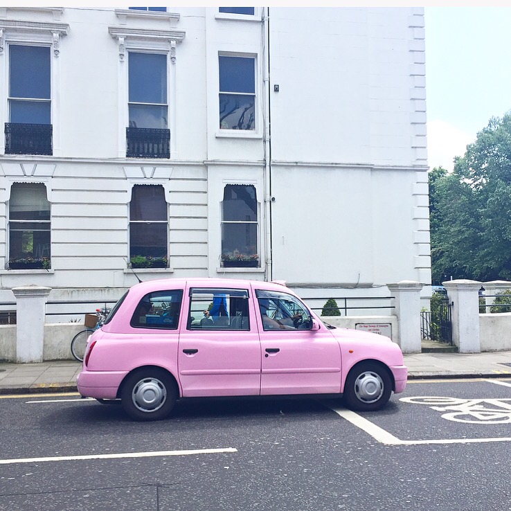 Pink cab on Ladbroke Grove in Notting Hill