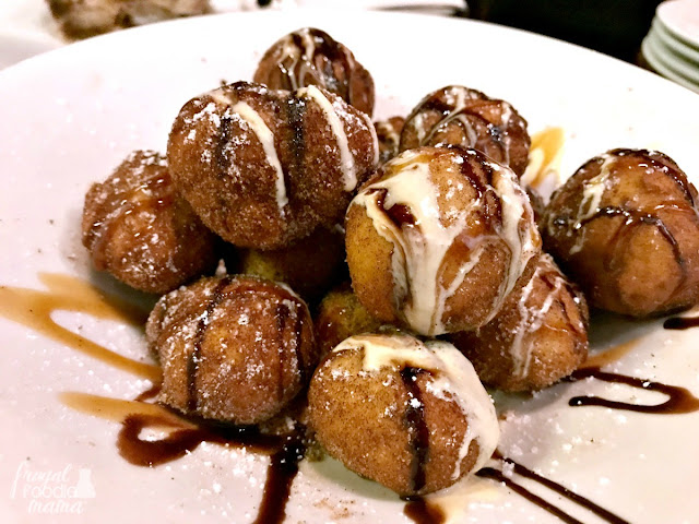 The Zeppole al Forno from Il Forno a Legna in McAllen, Texas are the Italian version of a doughnut- light & airy, dusted in powdered sugar & drizzled with a white chocolate ganache & chocolate sauce. 