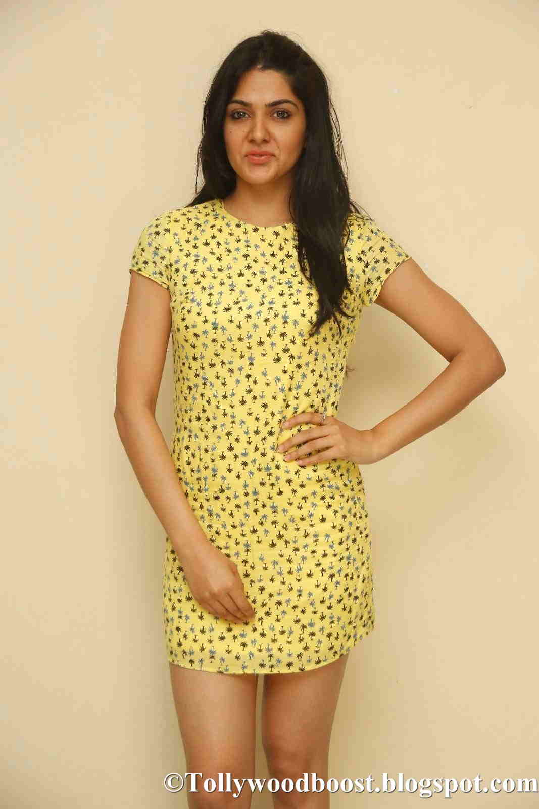 Actress Sakshi Chaudhary Long Legs Show In Yellow Mini Top