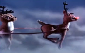 Rudolph leading the way in Rudolph the Red-Nosed Reindeer 1964 animatedfilmreviews.filminspector.com