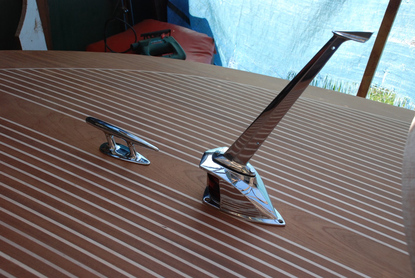 my wooden speed boat build Riva Style Bow light / cleat and bow fairleads
