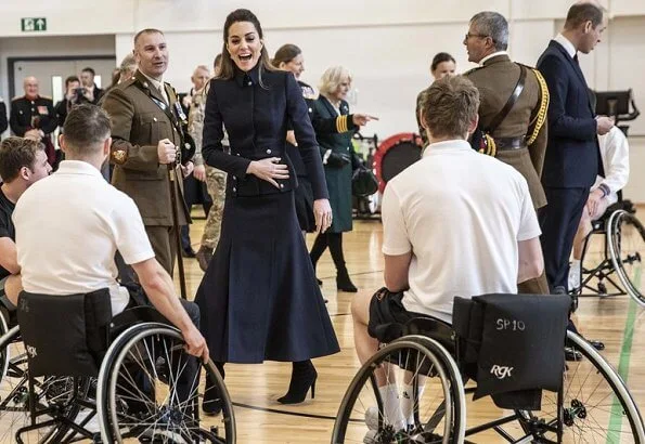 Kate Middleton wore Alexander McQueen military dress. the Duchess of Cornwall, together with the Duchess of Cambridge