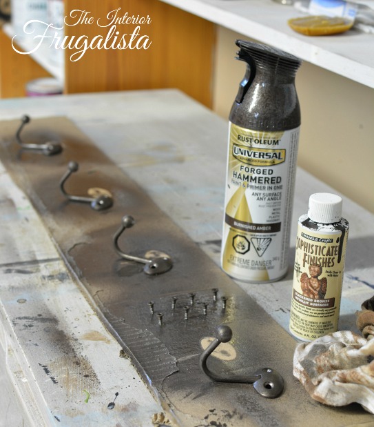 A handy wall-mount DIY Dog Leash Holder with rustic charm using fence boards and vintage copper art. Handy dog leash organization for the back door.