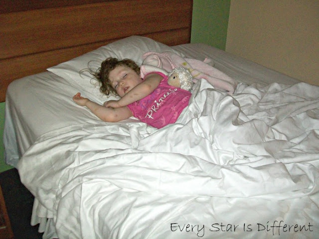 Enjoying the first night's sleep in a Disney hotel
