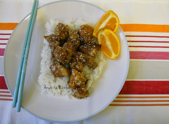 A plate of gluten-free sesame orange chicken from www.anyonita-nibbles.com