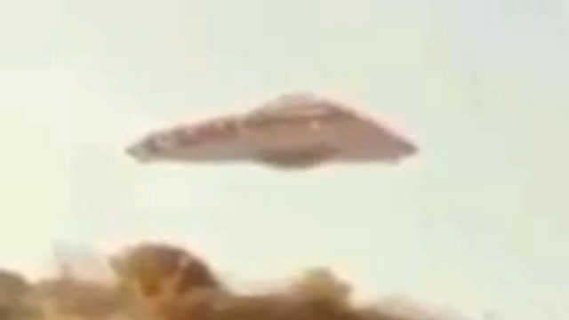 Triangle UFO above a mountainous ridge looks like a man made TR3b.