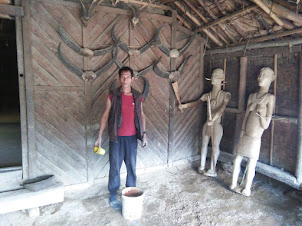 Mr Nahnyei.Wangnao,  the head of the Wangnao family in his Heritage Konyak hut.