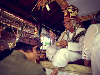 Blessing Is Also Done To The Parents Of The Groom During Balinese Wedding Ceremony At Badung, Bali, Indonesia