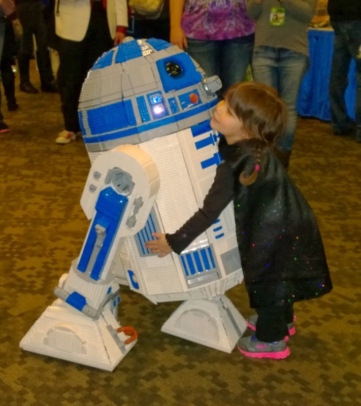 Darth Lily comforting R2-D2 after she scared him so badly