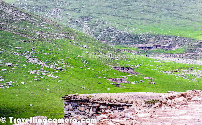 Peer Ki Gali is an amazing place on old Mughal road in Jammu & Kashmir State of India. This place is the highest passes on Srinagar Rajouri historic Mughal Road at 11300 Feets... Let's check out this Photo Journey to know more about this place with appropriate photographs...Various water streams can seen flowing through snow covered peaks of Peer-Ki-Gali hills. Cool freeze, freshening environment and roaming clouds all over makes this place wonderful. After talking to various folks at Peer ki Gali, we got to know that almost every day it rains on these hills. We spent two days around it and we also experienced rain showers both the days...Here is a photograph of a shopkeeper inside his small shop made up of stones. He had almost everything that is usually required for routine life in hills. These families come to these high hills with their cattle, as this place has got more than enough grazing land which becomes a problem during a particular time of the year. Ziarat of Peer Baba on hill top has gained its popularity. Almost every vehicle passing by Peer-ki-Gali stops here to enjoy the panaromic view as well as to take blessings of Peer Baba. Green layer on Peer-Ki-Gali hills looks amazing and it's a huge range of hills with green meadows...Shepherd sitting in these green hills around Peer ki Gali... Almost every alternate hill was full of sheeps and horses... This trend was only noticed around Peer-Ki-Gali on Mughal Road...In past this place have been of great interest for trekkers and now easily accessible for others as well. Tourism is picking up in this region of Jammu and Kashmir now. This will not only boost the economy of the state but also open new aspects to the residents.CRPF folks can seen here and there around these hills to make every person safe on these hills around Peer ki Gali. Really these folks are working really well to give confidence to common people to enjoy the beauty around Mughal Road.Sheeps all around in green hills of Peer Ki Gali, Kashmir, India.All these water streams make the whole environment more beautiful. All these streams have chilling water of melted snow of hill-tops. Dark clouds covering blue sky with lush green hills having multiple white-water streams - this whole combination makes Peer-Ki-Gali a unique place.Local folks on this stretch can organize various trekking trips with all arrangements for lodging in tents or some othe wooden houses, which can good source of income going forward.Jammu and Kashmir state of India is known as heaven on earth. In the seventeenth century the Mughal emperor Jahangir set his eyes on the valley of Kashmir and Peer-Ki-Gali is one of the place they used to stay. There is an old Mughal Residence in deep valley. Mughals said that if paradise is anywhere on the earth, it is here, while living in a houseboat on the mesmerizing Dal Lake.  In Jammu and Kashmir the most important tourist places are Kashmir, Srinagar, the Mughal Gardens, Gulmarg, Pahalgam, Jammu, and Ladakh...It will take a long more time to further develop the area but nobody can deny that it's magical. This whole stretch is magnetic. It draws you closer and closer. As we packed up, the beauty of the place wanted me to linger more. But I returned home with some amazing memories to cherish forever; vivid pics in the heart and mind that won't fade or get lost ever. It is a place that can't be expressed in words and that can't be explained in pics; just plan a trip and experience it all yourself.Before militancy intensified in 1989, tourism formed an important part of the Kashmiri economy. The tourism economy in the Kashmir valley was worst hit. Many five stars in Srinagar can be seen which are not well maintained now and owners can't afford to spend more on those properties. However, the holy shrines of Jammu and the Buddhist monasteries of Ladakh continue to remain popular pilgrimage and tourism destinations. Every year, thousands of Hindu pilgrims visit holy shrines of Vaishno Devi and Amarnath which has had significant impact on the state's economy.The Vaishno Devi yatra alone contributes Rs. 450+ crores to the local economy annually.Tourism in the Kashmir valley has rebounded in recent years and in 2009, the state became one of the top tourist destinations of India. Gulmarg, one of the most popular ski resort destinations in India, is also home to the world's highest green golf course. However with the decrease in violence in the state has boosted the states economy specifically tourism.Peer ki gali has religious importance as well. Most of the folks crossing through this place, stop by and spend some time around the mazar of Peer baba. This is of the holy places for Muslim saints. Here people from almost all the religions comes in large number to pray, on Thursday.There are some beautiful waterfalls around Peer Ki Gali and number/flow depends upon the time of the year & amount the snow these hills have got. Some of them are seasonal and many of them can be seen during most of the year.Kashmir's official language is Urdu. However the main languages spoken are Kashmiri in the Kashmir Valley, Ladakhi in Ladakh and Dogri in Jammu. Most people can speak Hindi as a second language. As elsewhere in India, English is fairly widely spoken among the educated classes and those involved in the tourist industry.Here i a photographs showing typical style of houses in Peer-Ki-Gali on Mughal Road in Jammu & Kashmir state of India. Mainly made up of rock-stones and flat roof made up of wood & mud. They are quite spacious and are seasonal. People go down to their main towns during snowfall in this region.A view of deep valley with curved roads from Peer-Ki-Gali, Jammu & Kashmir, India.