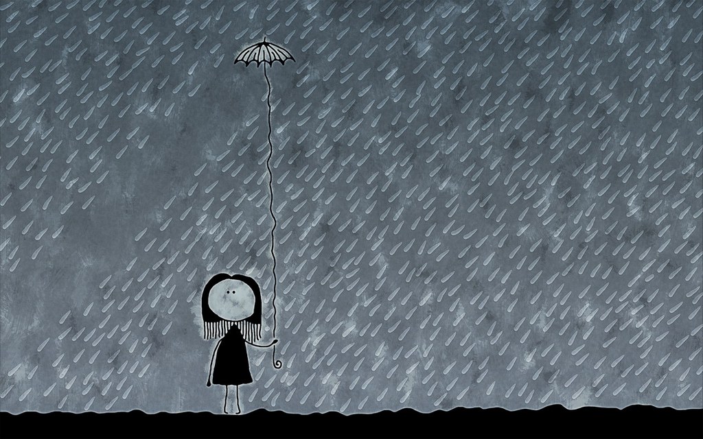 Mujer con sombrilla bajo lluvia