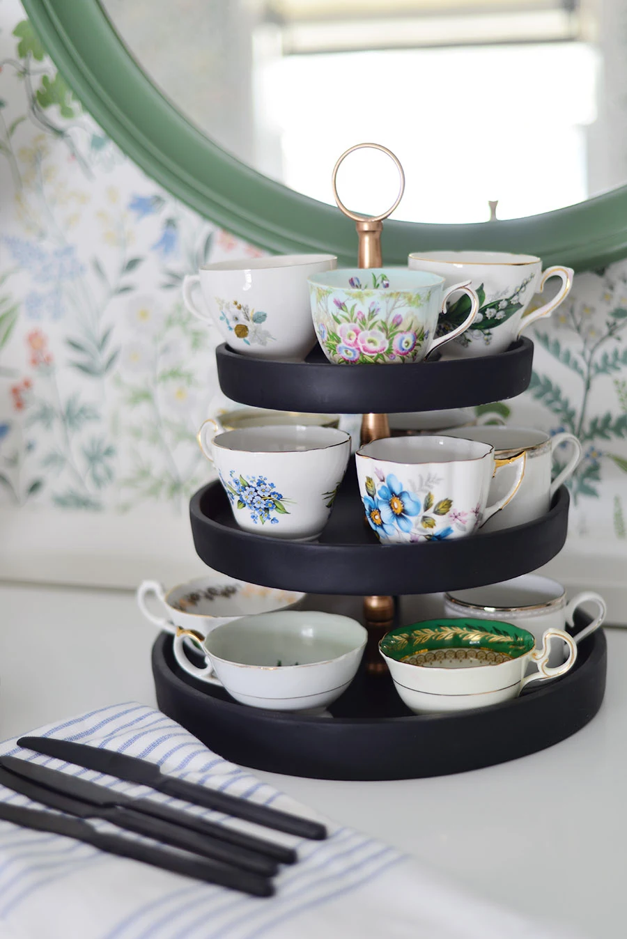 spring decorations for the home, Borastapeter flora white wallpaper, green round mirror, buffet display, teacups on tiered tray