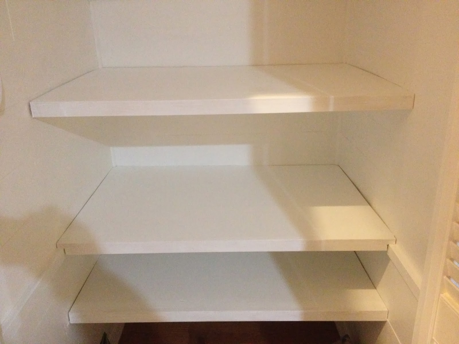 Stylish meets Organized Part 1 Under the Stairs Linen Closet