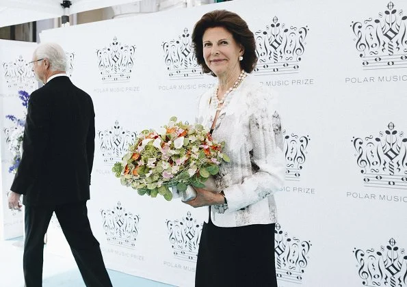 Princess Madeleine wore Giambattista Valli Green Garden Butterfly-print Tiered Silk-georgette Gown. Crown Princess Victoria wore Stylein One Shoulder red gown from Autumn Winter 18 Collection