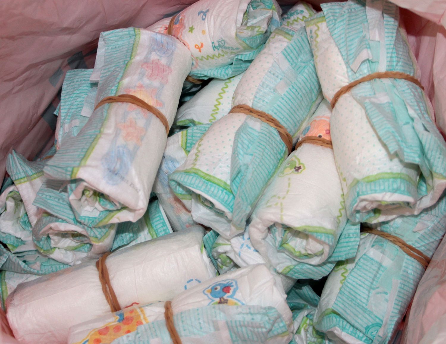 Purple crafts Nappy cake for surprise baby shower