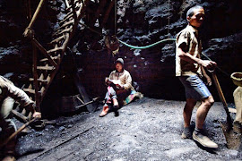 child reading in a mine